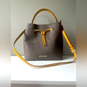 MICHAEL KORS Leather Trim Coated Canvas Bucket Bag.